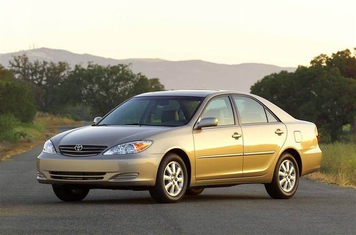 2003 Toyota Camry car parked on a road.