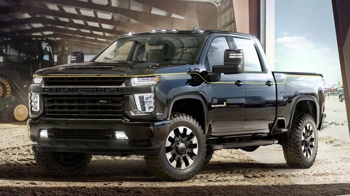 One of the best Chevy Silverados with yellow paint detail, crew cab, infotainment system, wireless Apple Carplay, and various powertrain options.