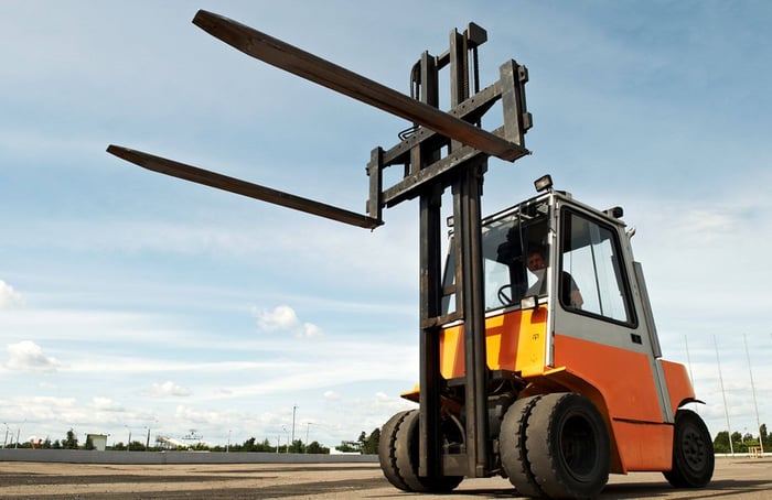 Forklift (warehouse equipment) with internal combustion, good fuel efficiency, cushion tires, and durable material handling capabilities.