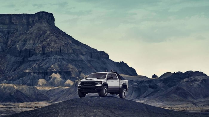 White Ram truck, one of the most reliable trucks on the market today, with crew cab parked in the mountains.