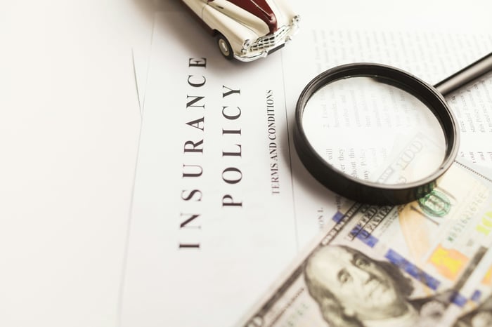 Vehicle insurance policy paperwork.