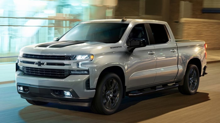 Silver Chevy pickup truck, a fourth generation Silverado, available with a diesel engine and leather upholstery.