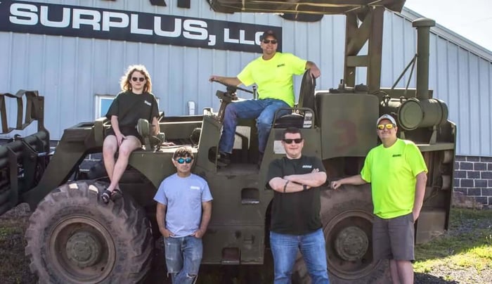 Adam Hoke with some of the Coleman's Military Surplus team.