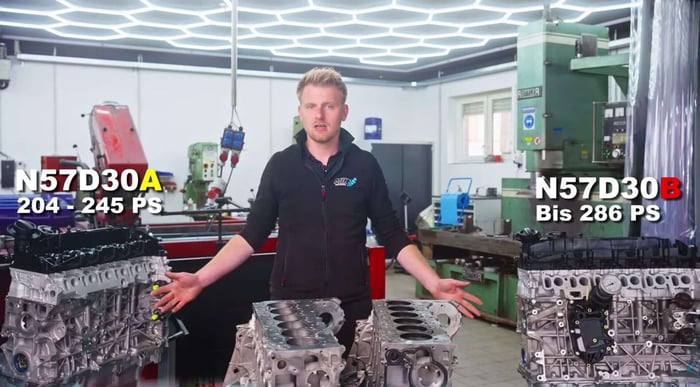 Marvin in der Werkstatt hinter drei unterschiedlichen BMW N57 Varianten