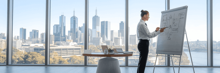 Two professionals planning strategy in Melbourne office.