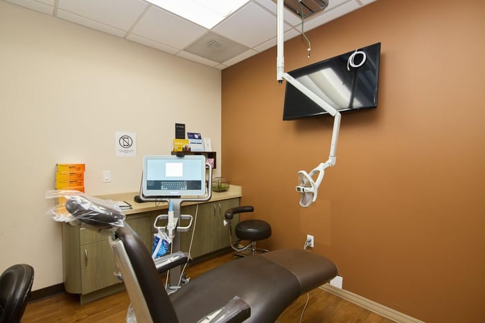 A room with a table and a computer