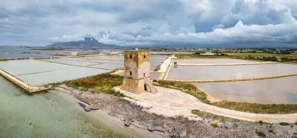 torre nubia saline di trapani ancient saltworks tower panorama sicily italy - marsala sicily stock pictures, royalty-free photos & images