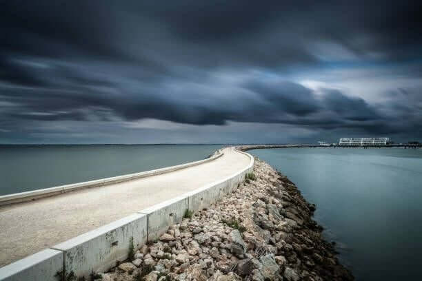 follow the storm - causeway stock pictures, royalty-free photos & images