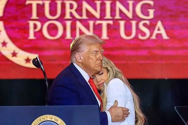 Erika Kirk joins U.S. President Donald Trump onstage during the memorial service for political activist Charlie Kirk at State Farm Stadium on...