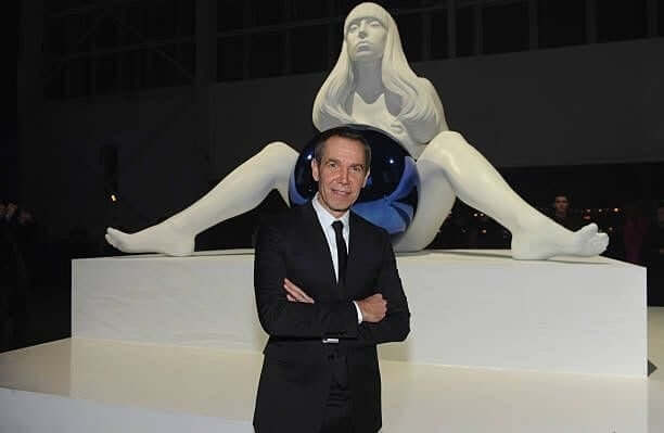 Jeff Koons poses in front of his statue depicting Lady Gaga at artRave" Press Conference at Brooklyn Navy Yard on November 10, 2013 in the Brooklyn... Jeff Koons poses in front of his statue depicting Lady Gaga at artRave" Press Conference at Brooklyn Navy Yard on November 10, 2013 in the Brooklyn...