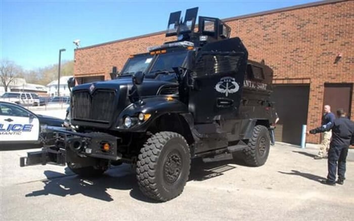 Willimantic, Conn.’s war-tested Mine Resistant Ambush Protected vehicle is parked outside the village’s Police Department. The MRAP was given to the town by the U.S. military and will be used by the department’s SWAT team to deploy officers safely, rescue officers and residents, and negotiate in barricade situations. Willimantic, Conn.’s war-tested Mine Resistant Ambush Protected vehicle is parked outside the village’s Police Department. The MRAP was given to the town by the U.S. military and will be used by the department’s SWAT team to deploy officers safely, rescue officers and residents, and negotiate in barricade situations.