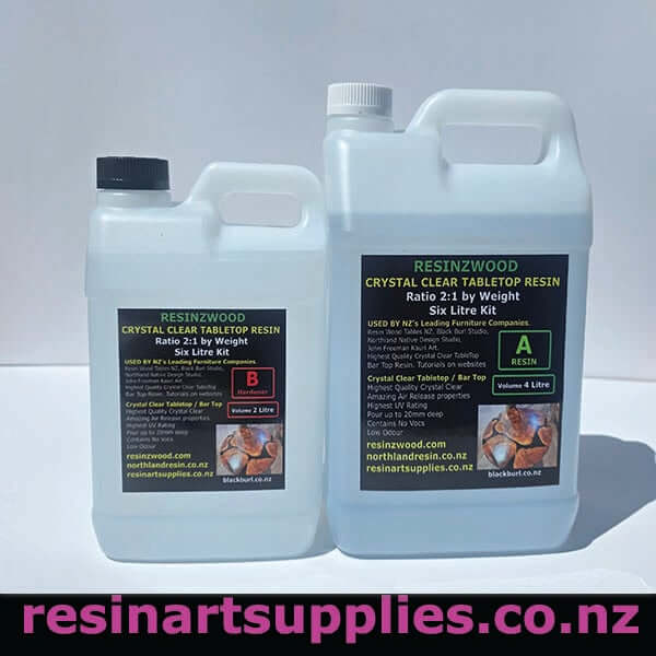 2 bottles of resinzwood crystal clear tabletop resin on a grey background