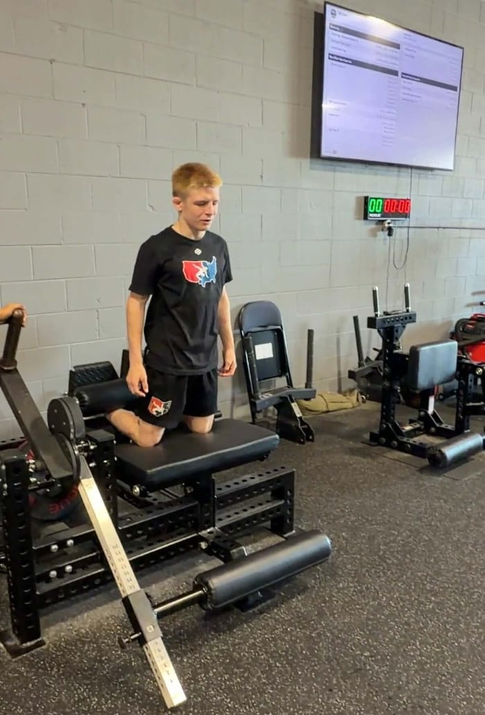 Rylen Wax training at Westside Barbell with the inverse curl machine