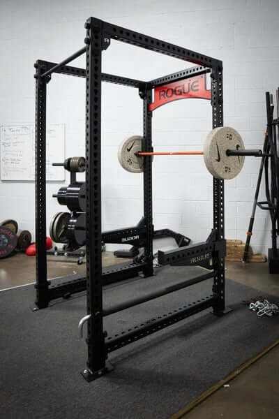 Nike Olympic Bar Loaded with 45 lb Bumper Plates at Westside Barbell