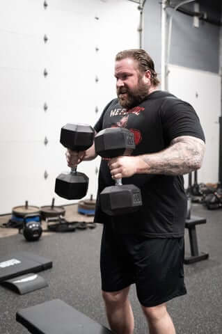 Tommmy Richardson Navy Seal Dumbell Curl at Westside Barbell