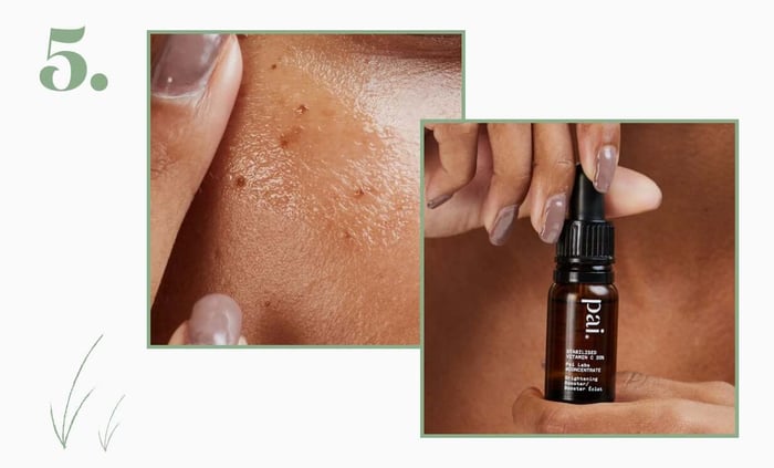 Hand holding Pai Rosehip BioRegenerate Oil serum bottle with close-up of textured skin showing product absorption