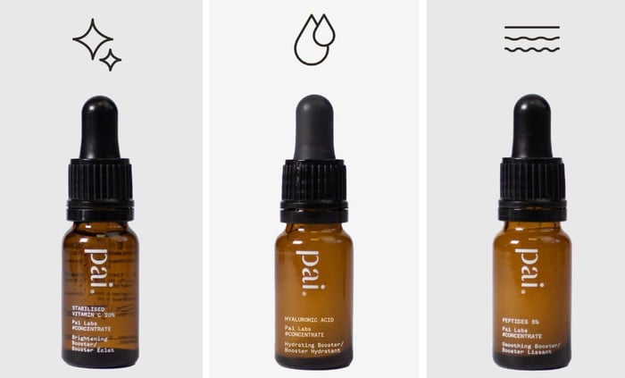 Three Pai Skincare facial serums in amber glass bottles with droppers - Vitamin C, Hyaluronic Acid, and Peptides boosters for sensitive skin