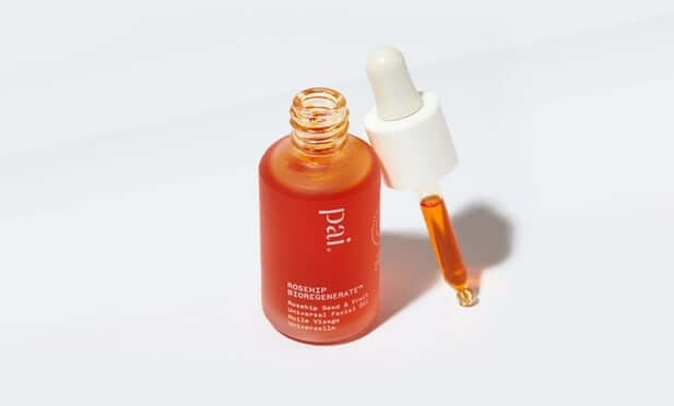 Pai Rosehip BioRegenerate Oil bottle with dropper, showing rich amber-colored face oil serum on white background