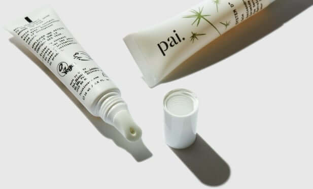 Pai Echium & Argan Eye Cream and Under Eye Brightening Serum with pump cap removed showing gentle formulations for sensitive eyelid skin