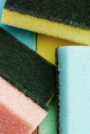 Colorful biodegradable kitchen sponges made from natural materials as plastic-free cleaning alternatives