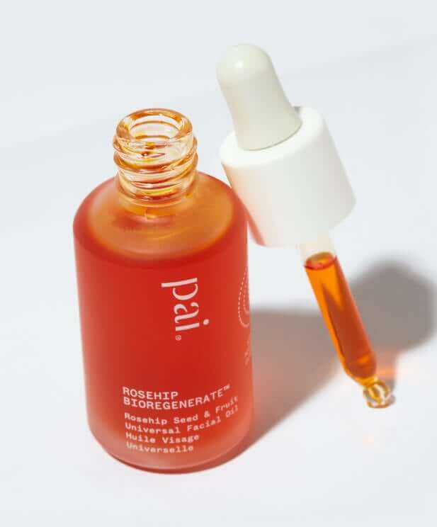 Pai Rosehip BioRegenerate Facial Oil bottle with amber glass and white dropper cap displaying golden oil