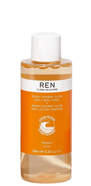 REN Ready Steady Glow AHA toner bottle in orange packaging with white pump dispenser
