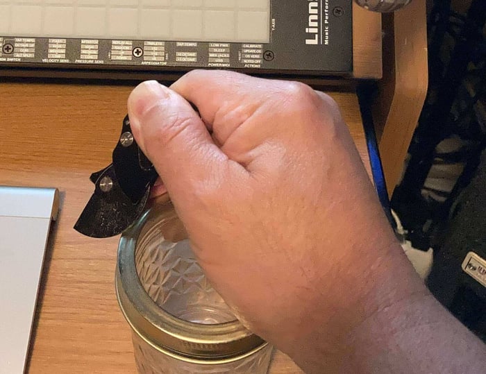 Knife-scraping on a Mason jar