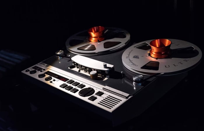 Exciters and saturators are technically similar in that the desired effect is the addition of harmonic content into your production to achieve a desired “vibe”. But where they largely differ lies in the function of tape saturation.