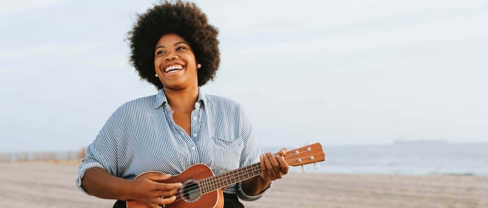 girl-playing-uke-on-beach.jpg