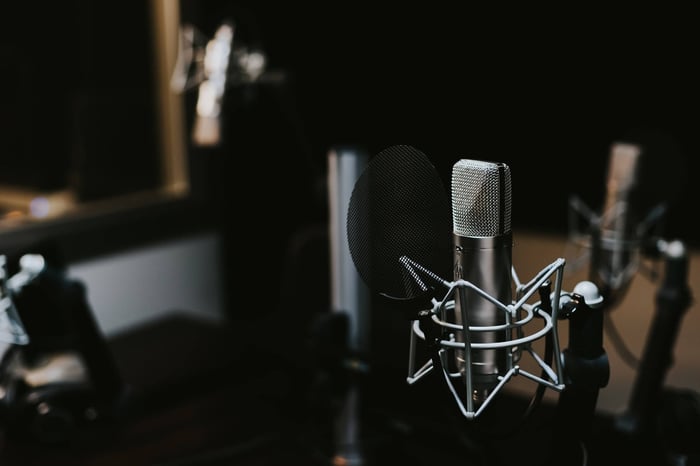 Experiment with indirect microphone placement in your podcast studio to find a natural-sounding recording with reduced plosives.