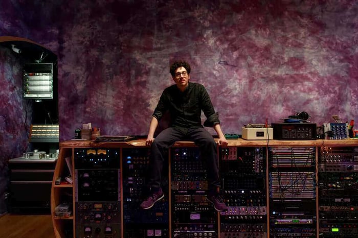 Ben Kane with Electric Garden’s extensive inventory of outboard gear (Brooklyn, NY). Photo by Shotti.