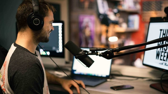 Proper microphones, monitoring systems, room treatment, and audio interfaces are all important considerations when building a podcast studio.