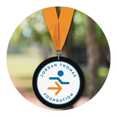 Custom acrylic medal awards for charities, fundraisers, and causes.