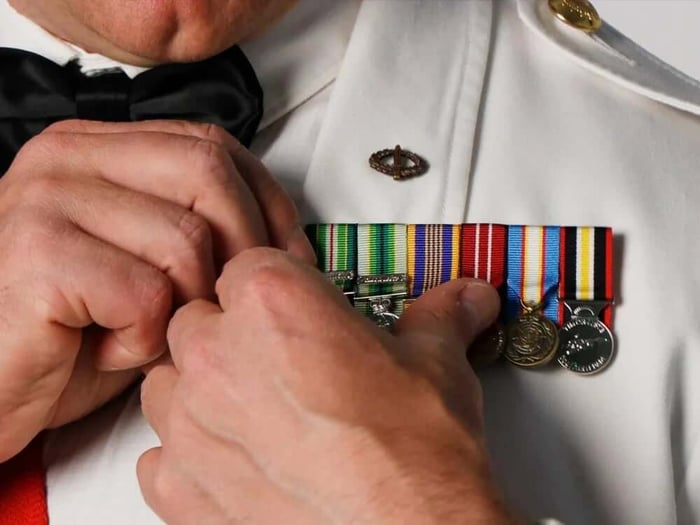 wearing military award medals