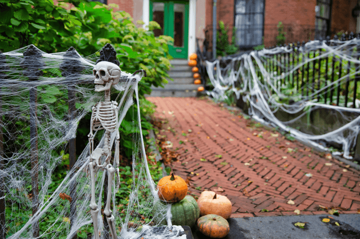 A decorated entrance for a Halloween mystery party game