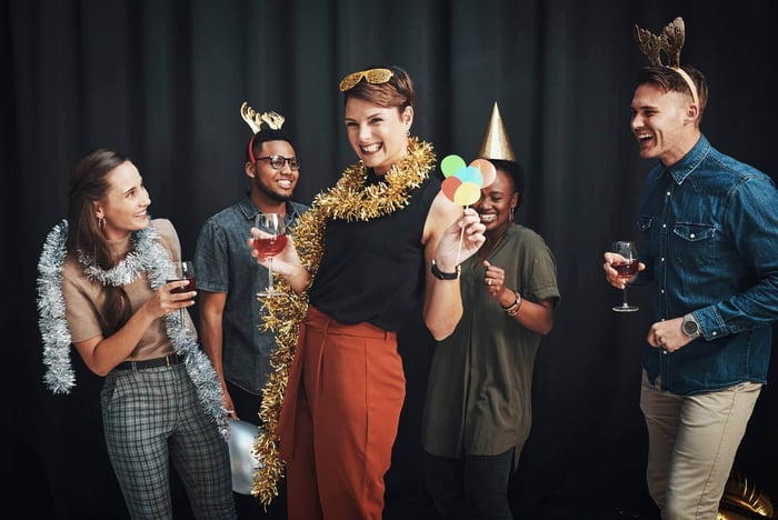 Friends having a blast at a murder mystery party
