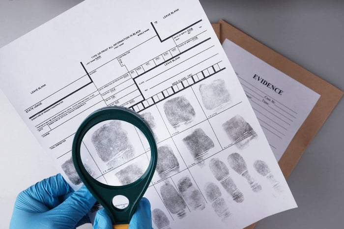 Investigating a crime at a mystery party game by My Mystery Party.