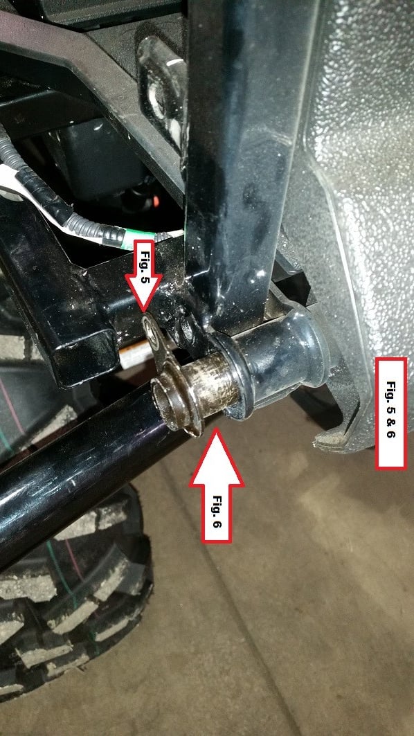 The pivot pin at the bottom of the Pioneer 1000-6 tailgate with the mounting bracket in position
