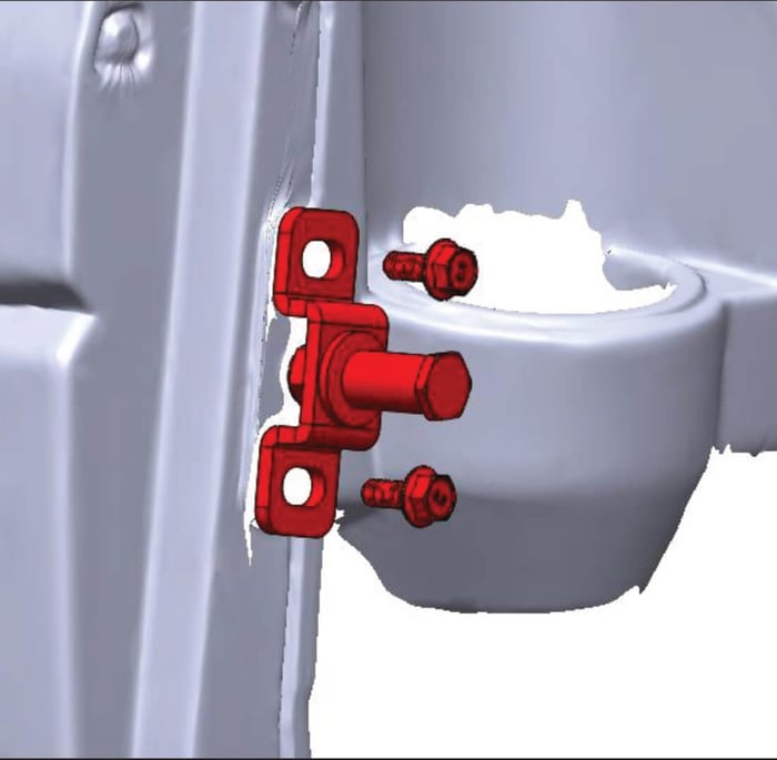 Front striker bolt assembly mounted near the cup holder