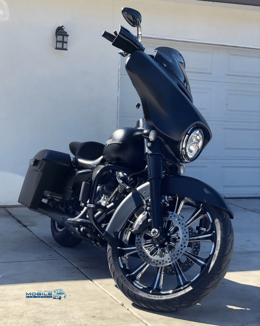 Mirror-finish chrome on a Harley-Davidson following professional motorcycle detailing and specialized metal polishing to remove coastal oxidation.