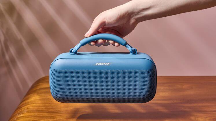 The sleek Bose SoundLink Max in hand
