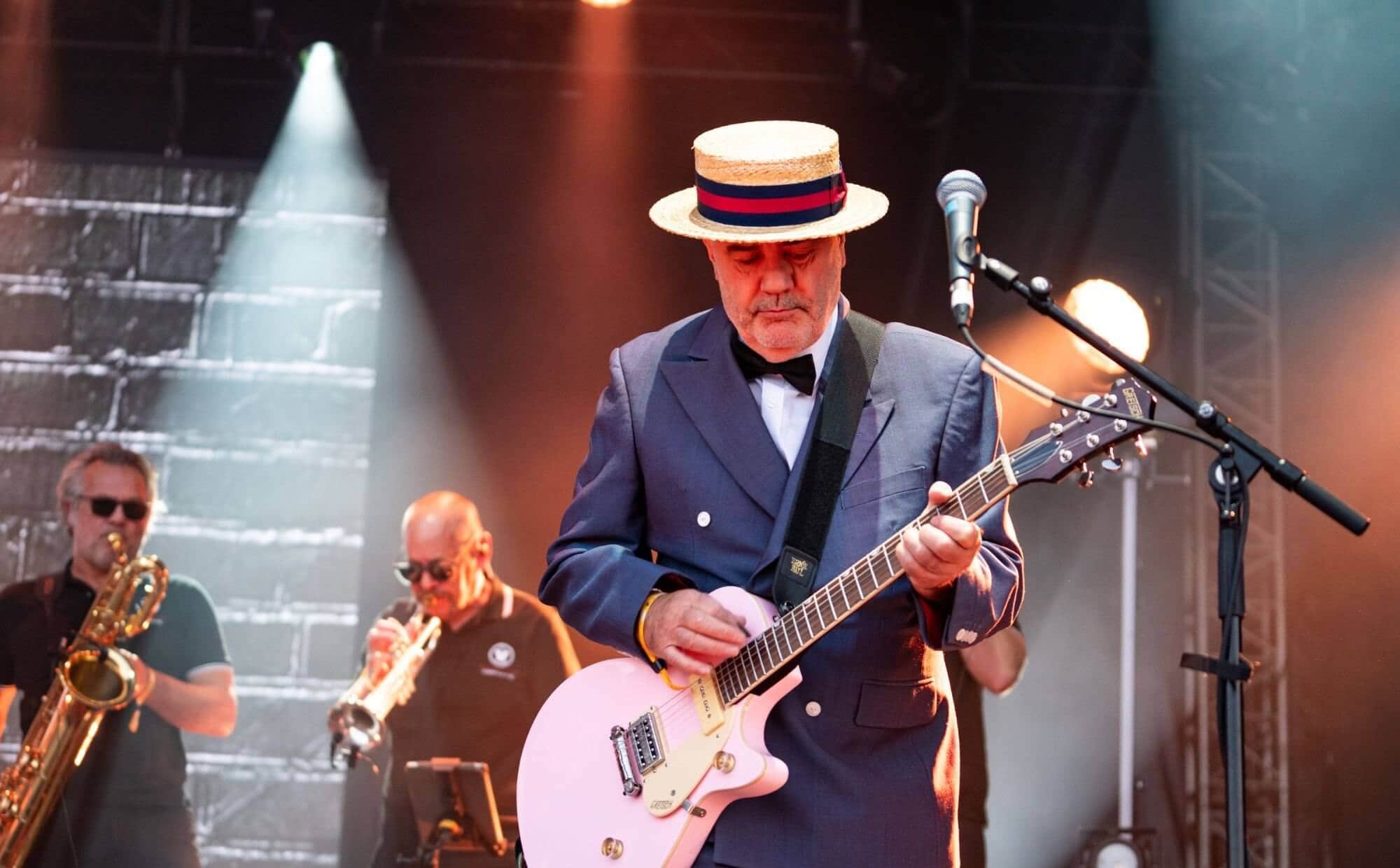 Chris Foreman of Madness during a performance