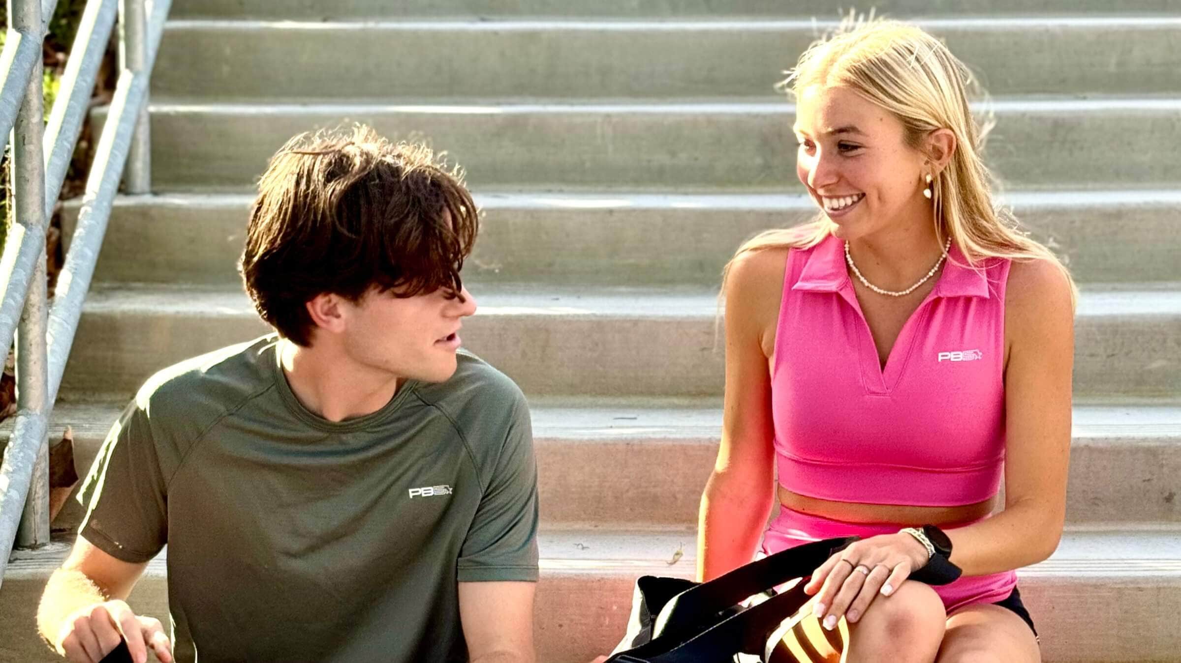 Two players discussing pickleball