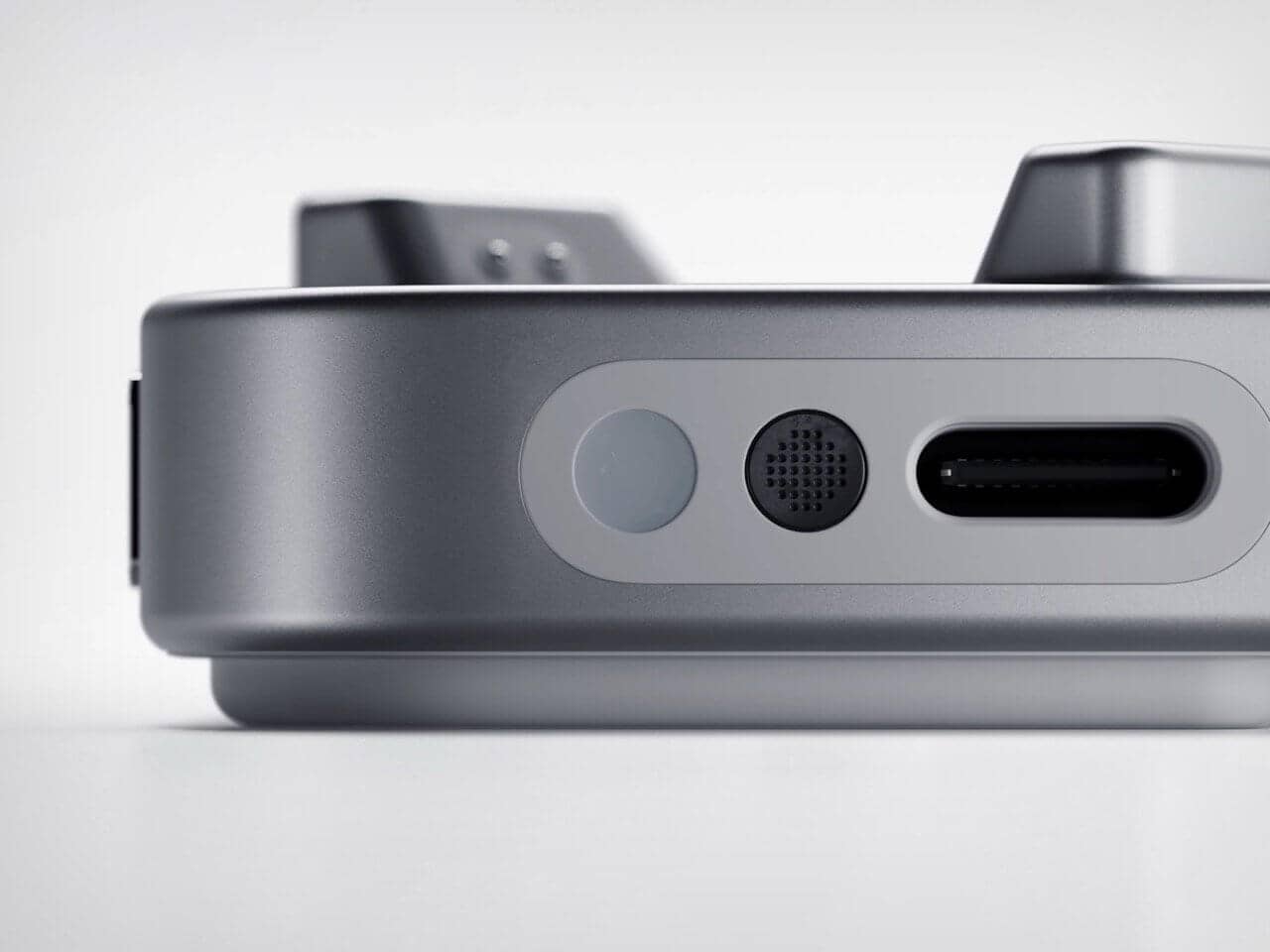 Ear (3) earbuds resting inside the charging case, showing the sleek design
