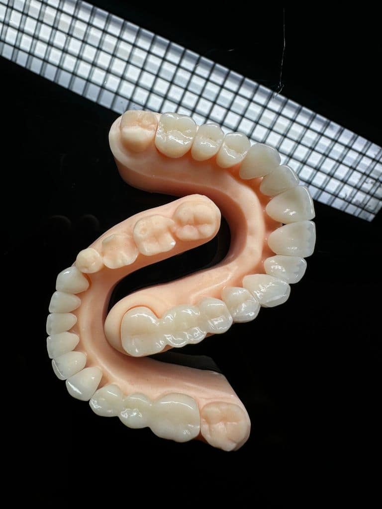 Denture Care Guide: Cleaning, Adhesives, and When to See a Prosthodontist