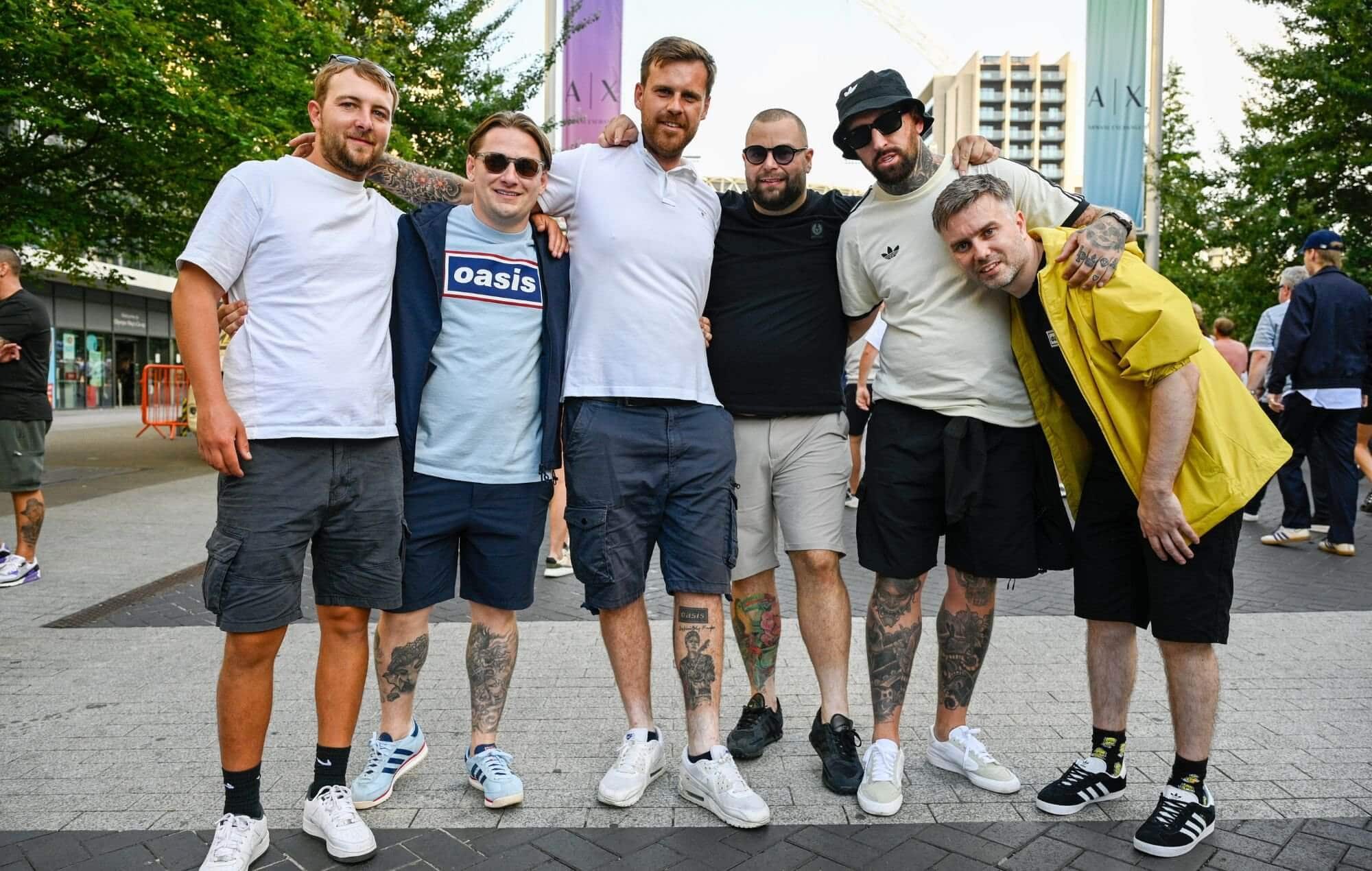 Oasis fans arriving at the Oasis Live '25 Tour at Wembley Stadium