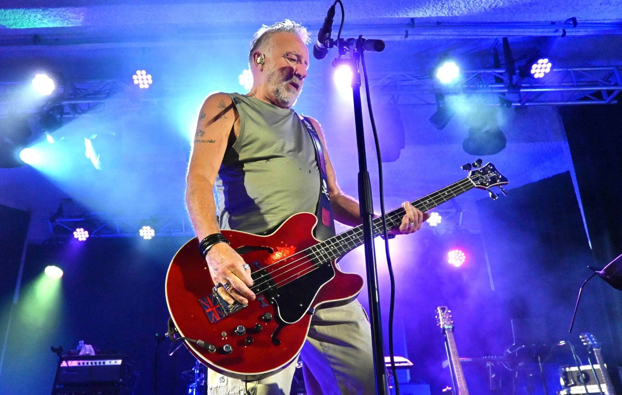 Peter Hook performing live in 2025