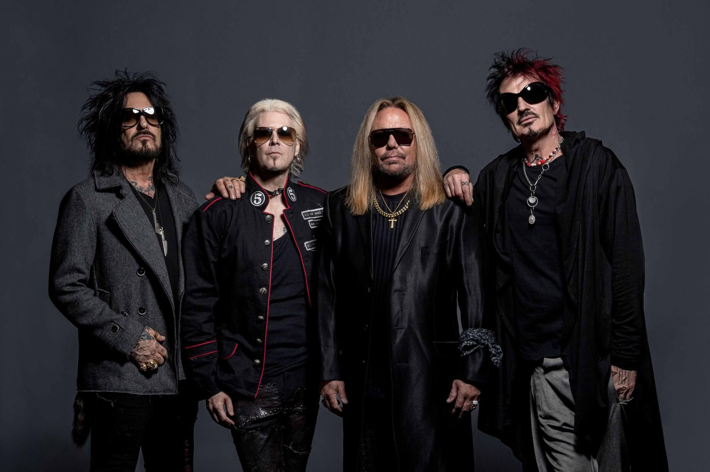 Mötley Crüe rocking the stage (photo by Ross Halfin)
