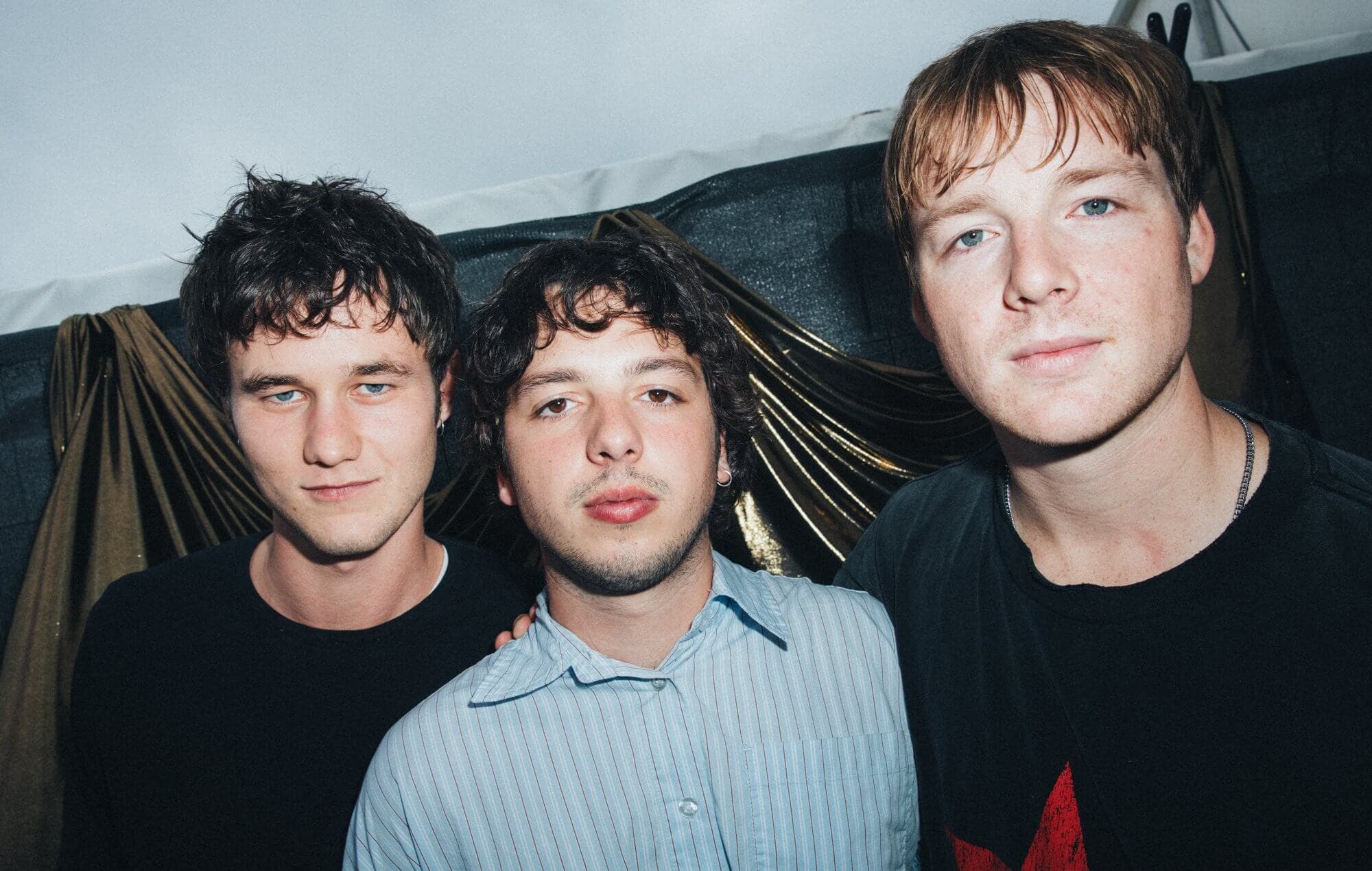 Radio Free Alice members backstage during their festival run