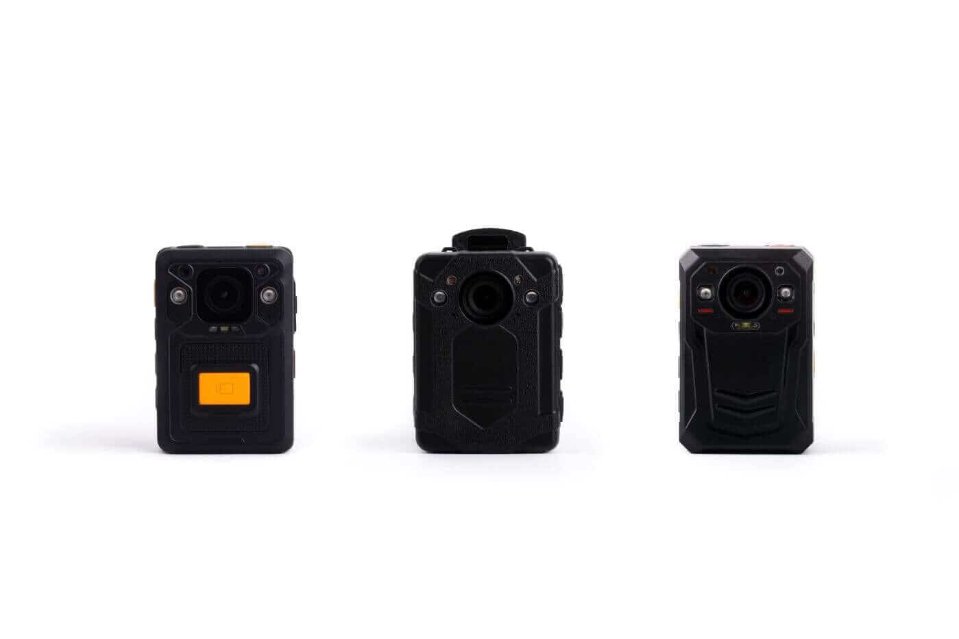Officer wearing a body-worn camera, representing the redaction labor behind video redaction fees for FOIA footage